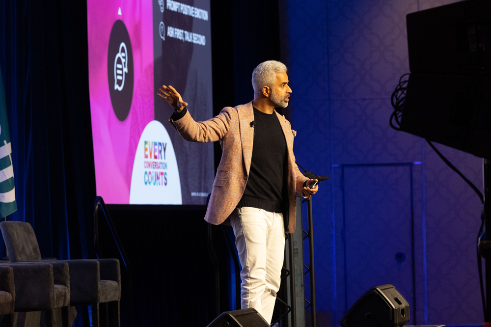 Convention speaker - 1500 x 1000 Man talks on stage